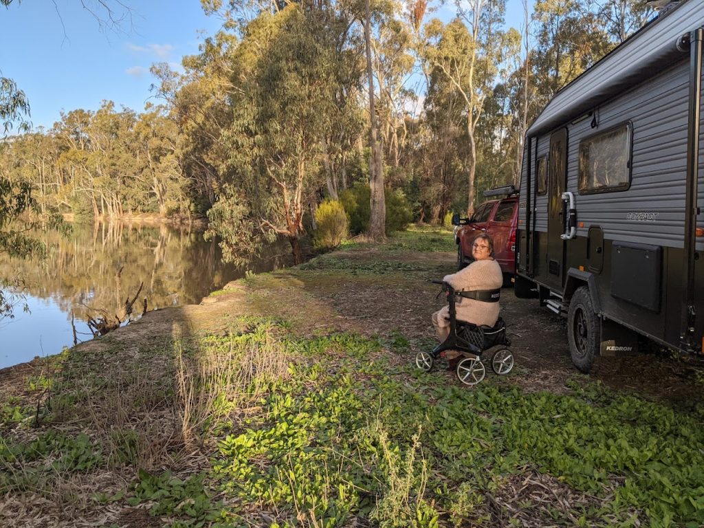 Heather alongside the Caravan alongside the River Murray